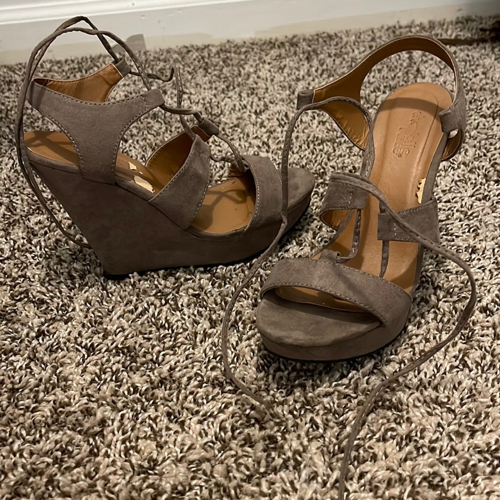 Wedge strap heal in a taupe color
